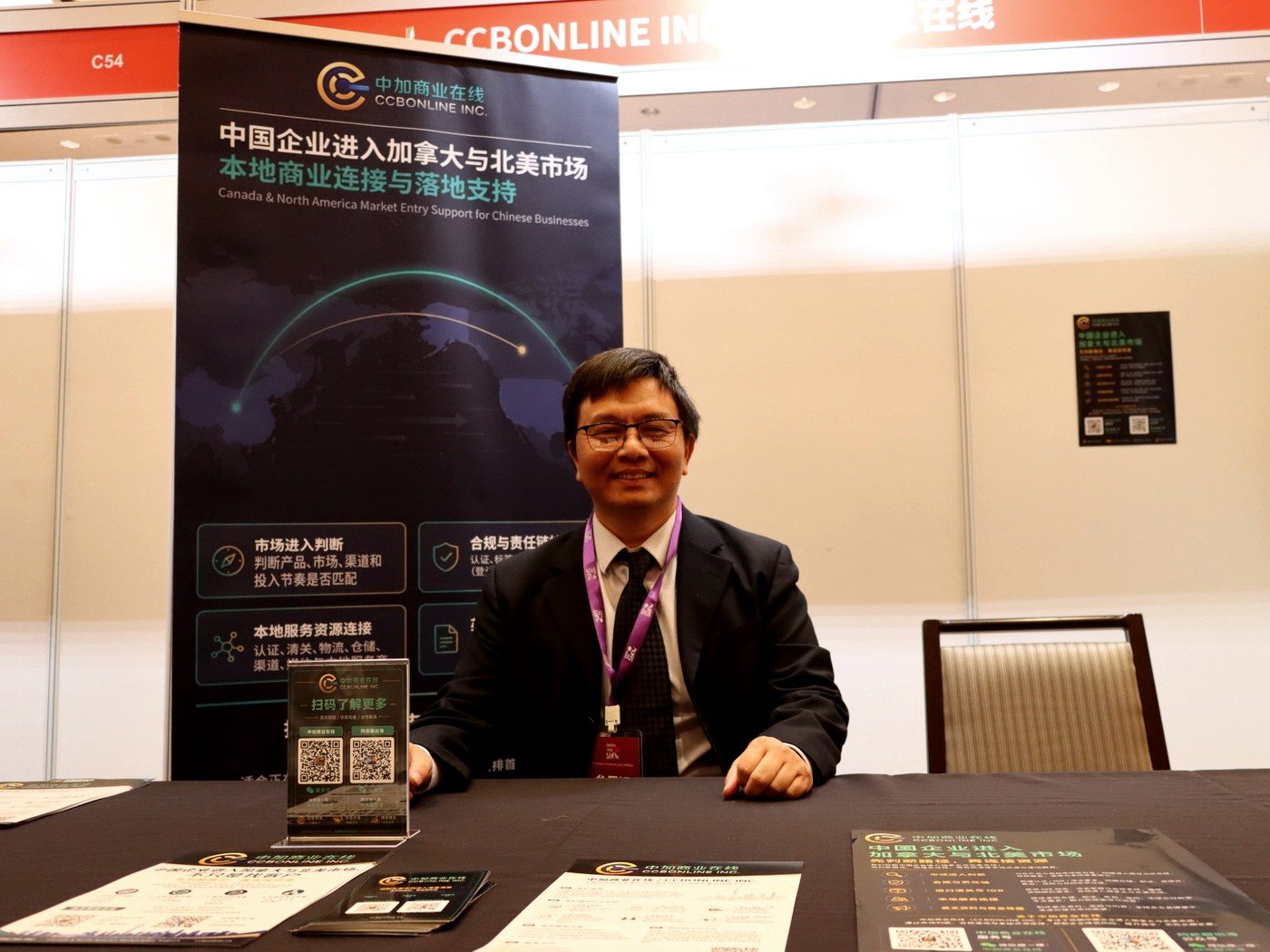 Kai Chen, founder of CCBONLINE INC., at the company booth during Toronto Trade Show 2026