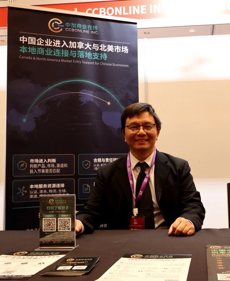 Kai Chen, founder of CCBONLINE INC., at the company booth during Toronto Trade Show 2026
